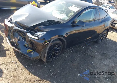 2022 Tesla Model Y Long Range Dual Motor All-Wheel Drive z USA, uszkodzony, nr VIN 7SAYGDEE0NA007100